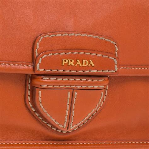 prada clutch orange|Prada handbags.